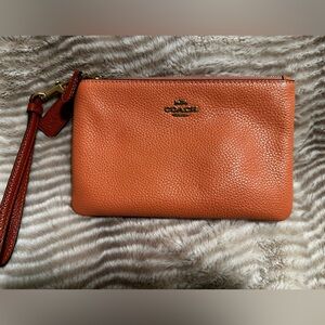 Coral Coach Wristlet